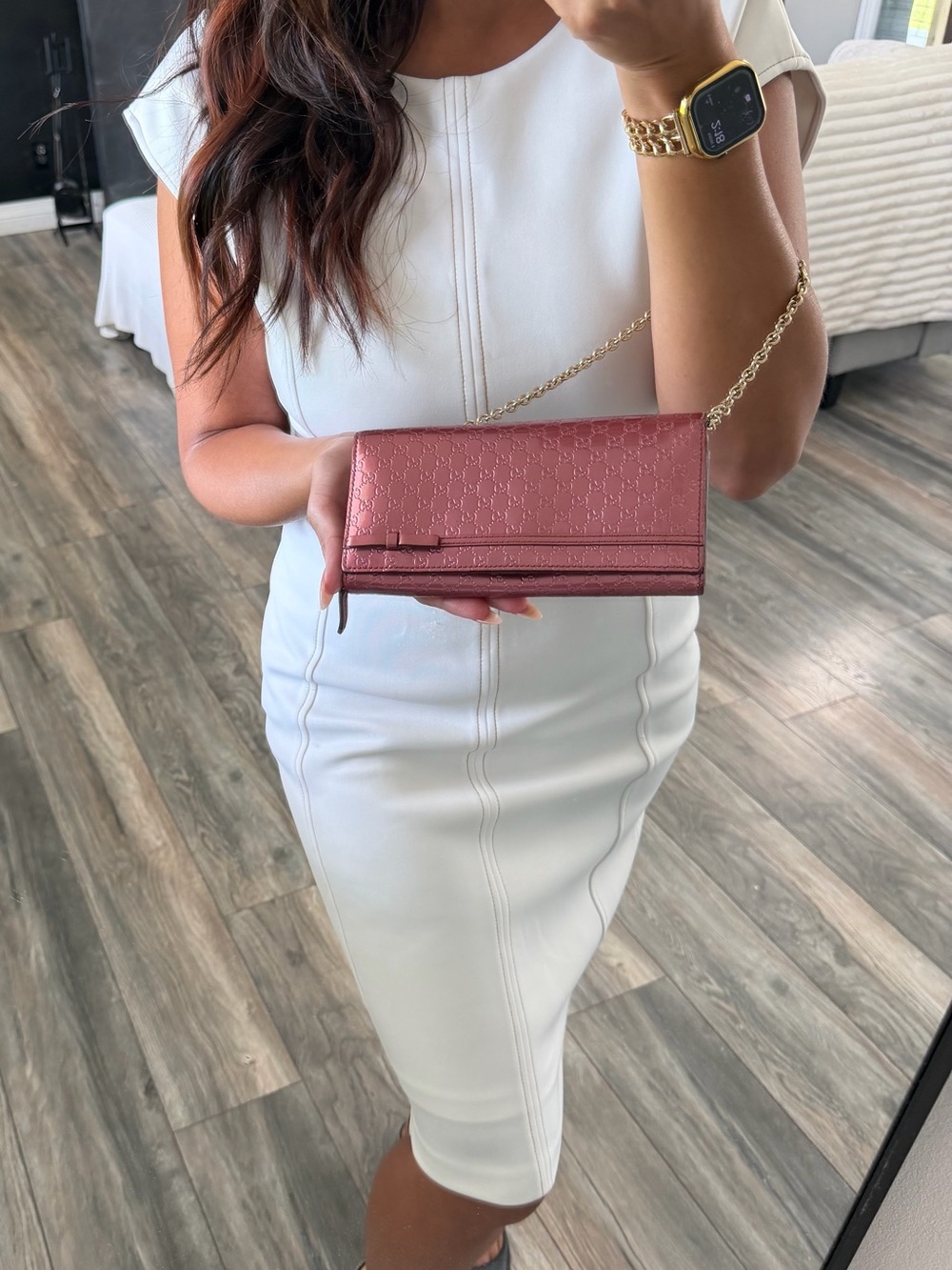 Gucci GG Embosed WOC bag